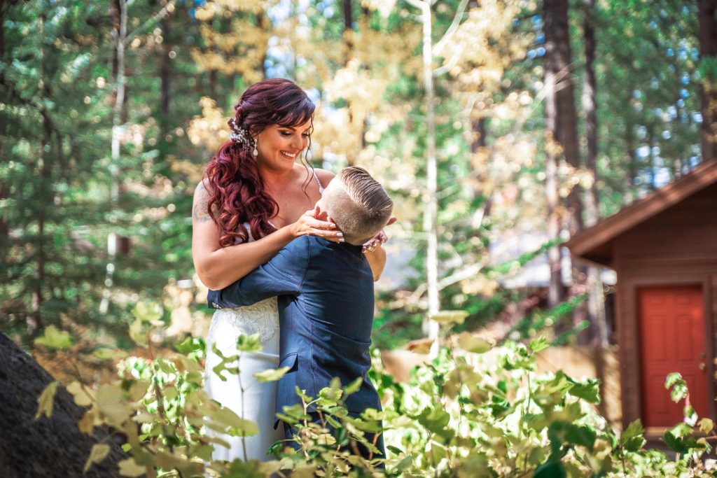 Lake Tahoe Wedding Photography Portfolio Bride hugging her young son before the wedding ceremony