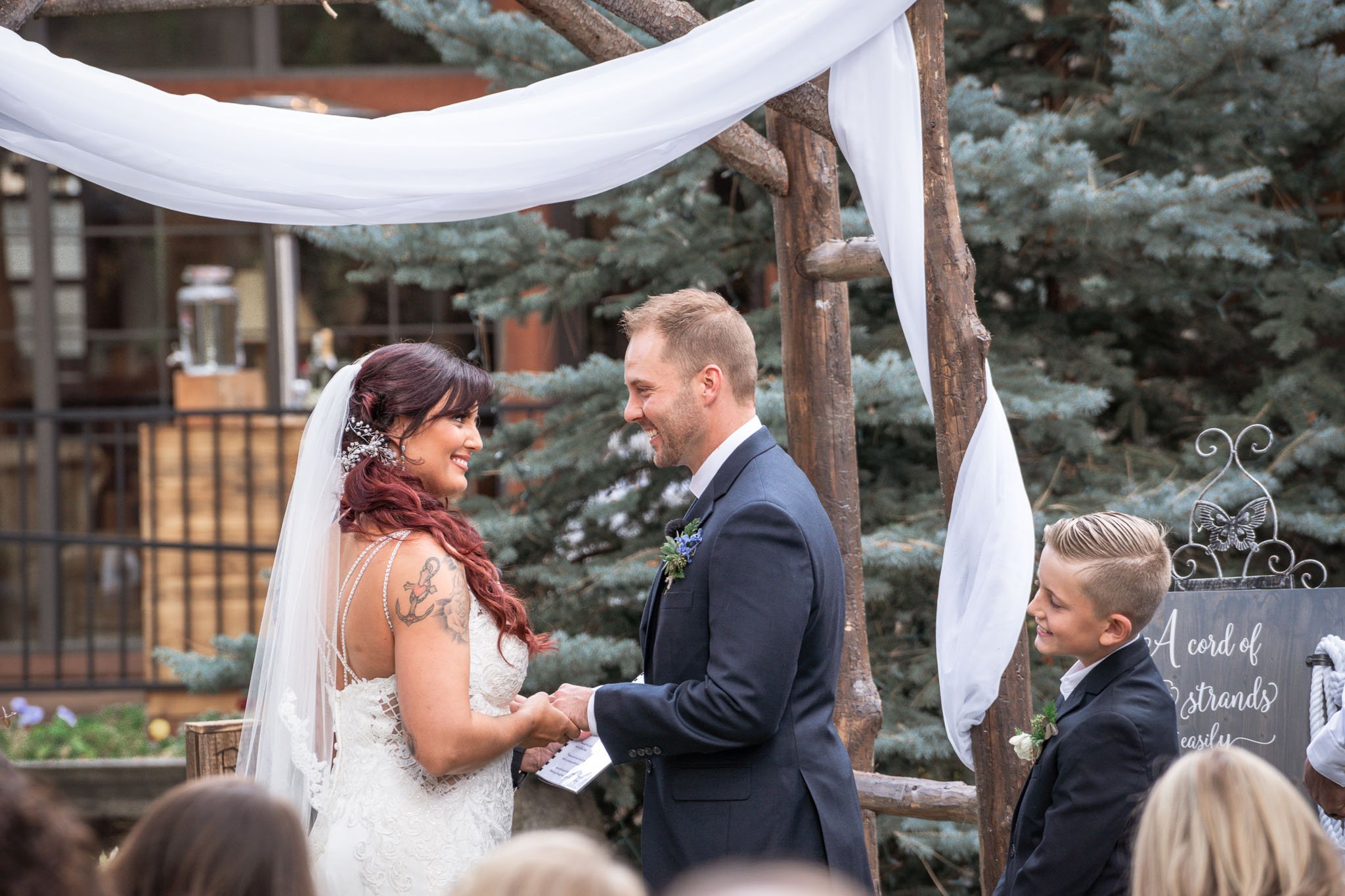 Black Bear Lodge Wedding | Jackie + Rick Bride, groom, and young son say their collective vows to become a family