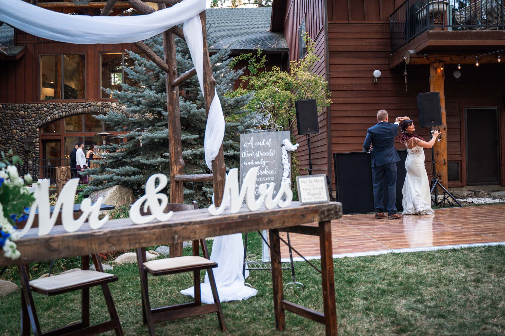 Black Bear Lodge Wedding | Jackie + Rick First dance with bride and groom behind the arch