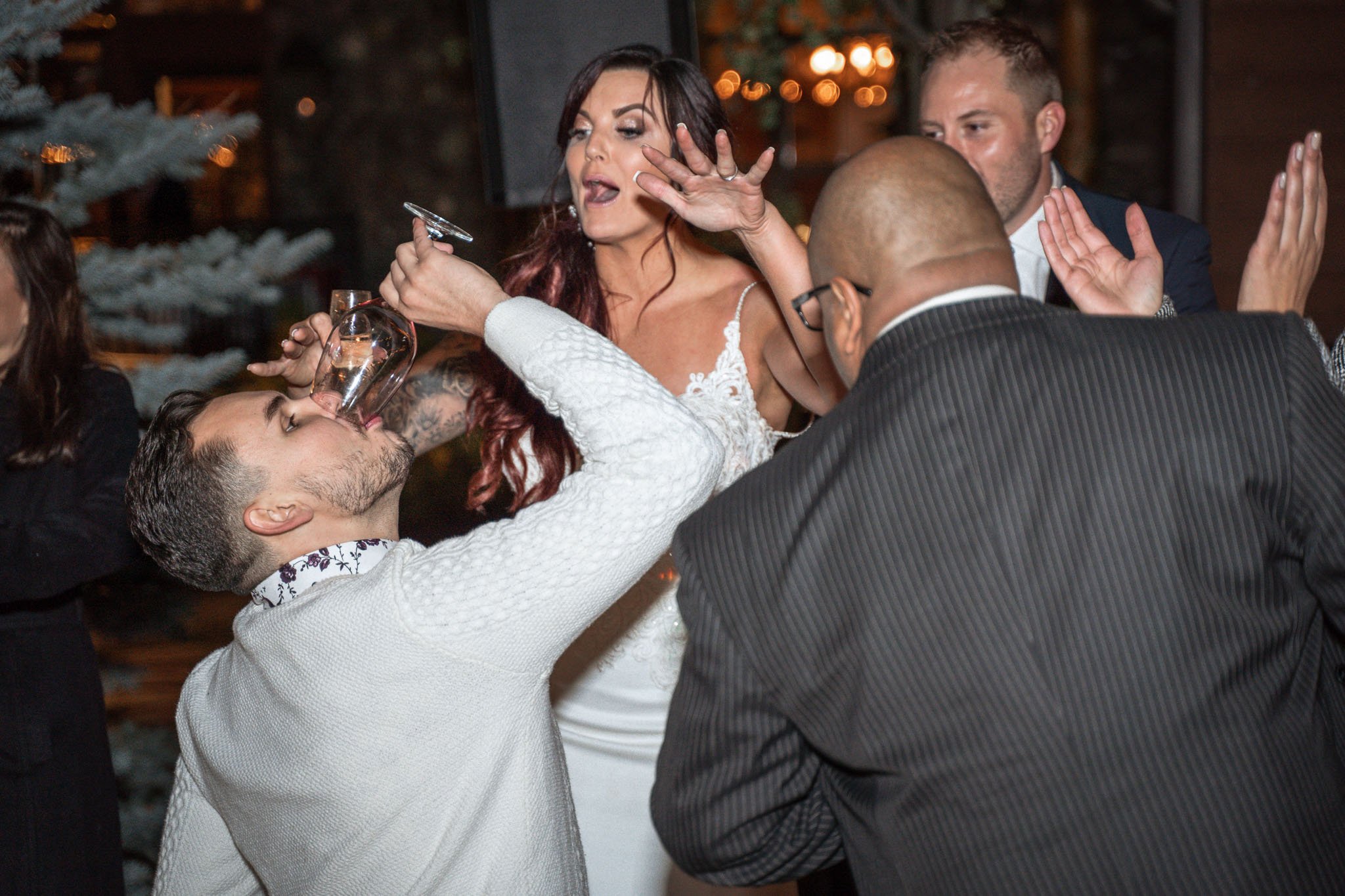 Black Bear Lodge Wedding | Jackie + Rick Dance party with man and bride drinking wine while dancing