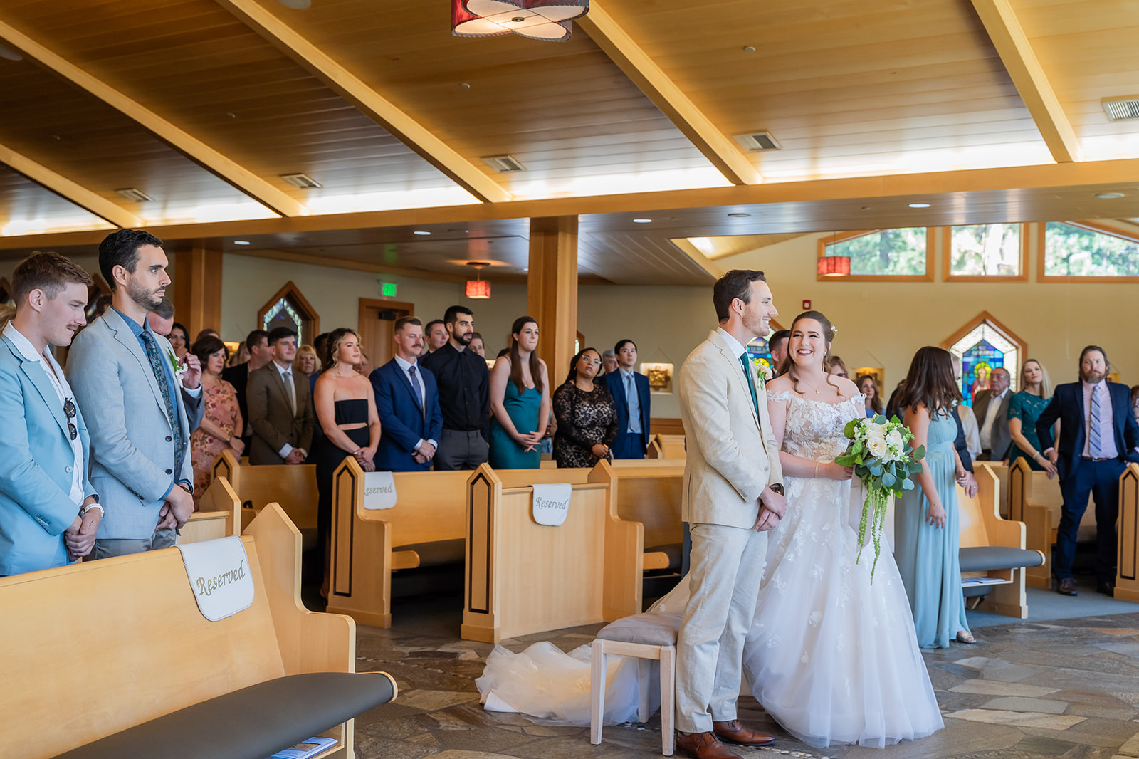 Bride and groom exchanging vows at St. Francis of Assisi