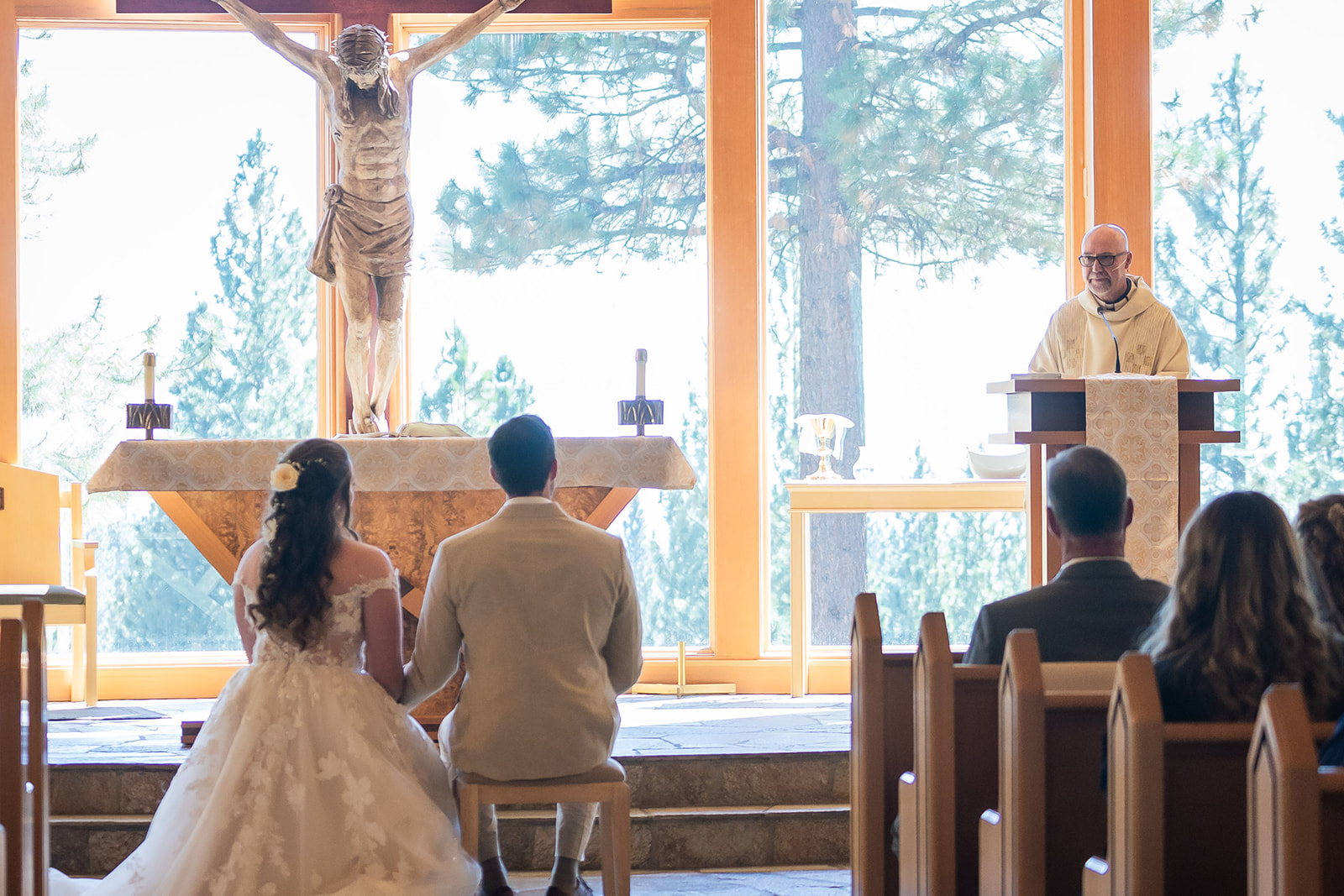 Couple walking down the aisle at St. Francis of Assisi wedding