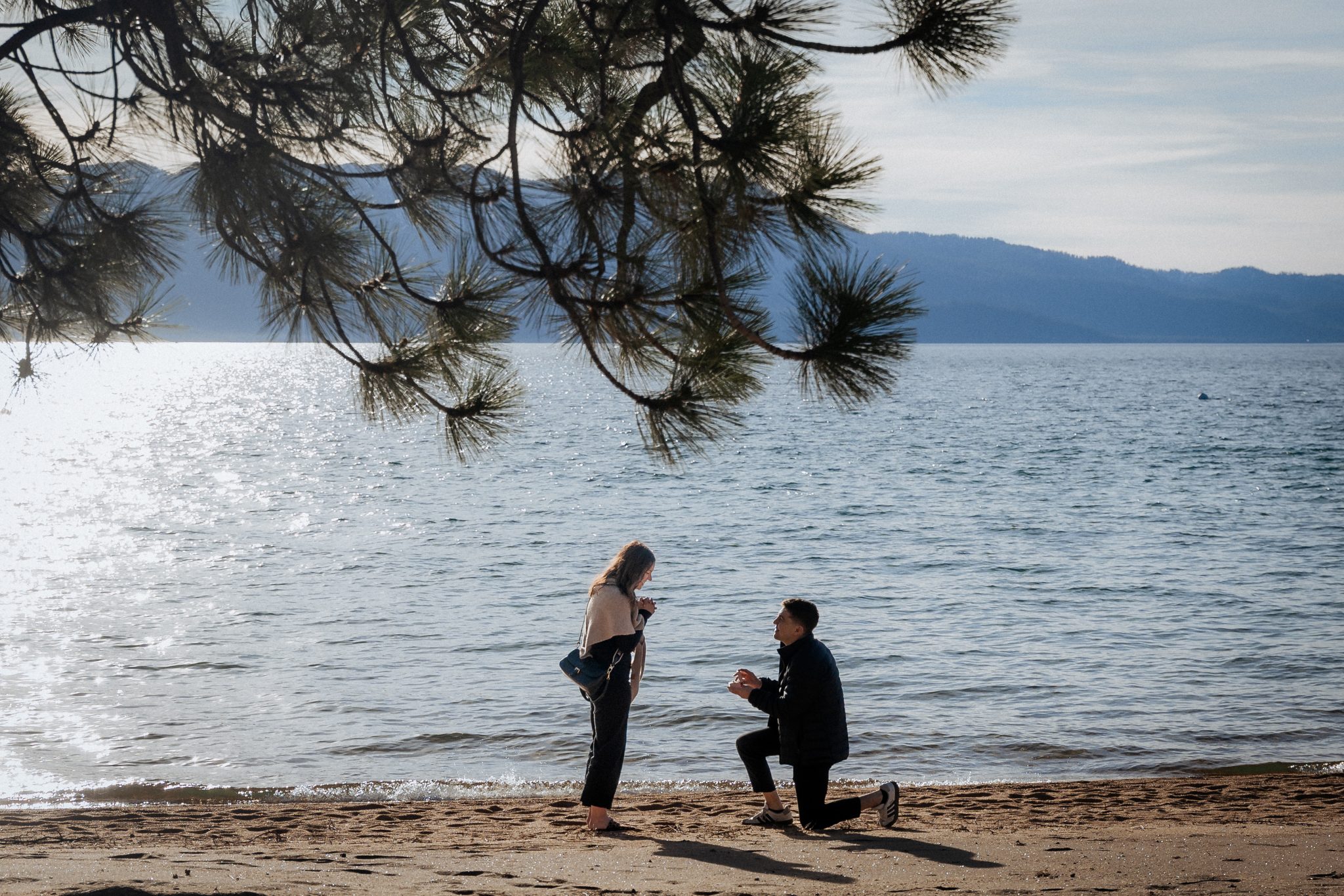 Edgewood Tahoe Resort proposal on the shores of Lake Tahoe with a surprise engagement and scenic mountain views.